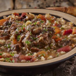 Rustic stew with bread slices